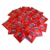 Kusové jahodové kondómy Durex v červenom obale.