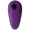Malý bezdotykový stimulátor klitorisu Womanizer Starlet fialovej farby.