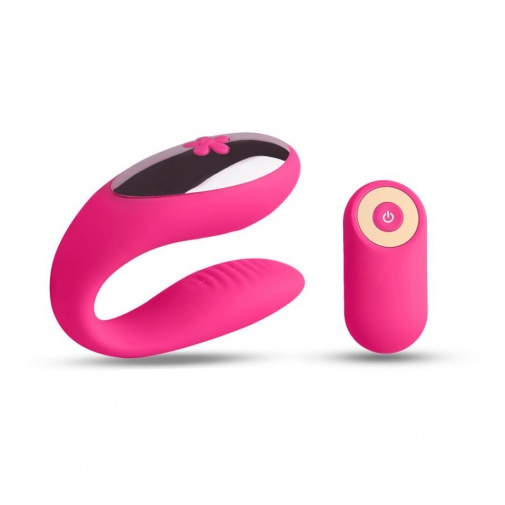Ružový silikónový vibrátor pre pár v tvare písmena U s bezdrôtovým ovládačom - Love Nest.