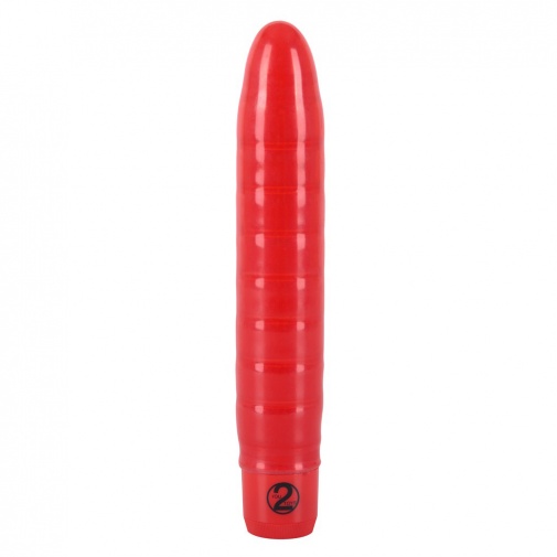 Želatínový vibrátor pevného tvaru červenej farby s vlnkovým povrchom.