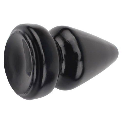 Čierny análny kolík veľkosť XL intenzívne stimuluj a rozťahuje konečník. 