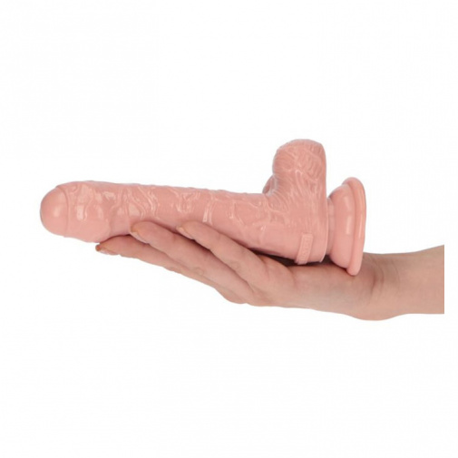 Detail na veľkosť realistického telového dilda v tvare penisu.