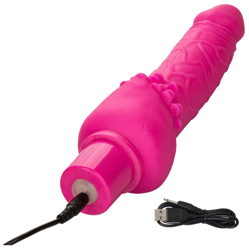Nabíjateľný ružový vibrátor spolu s USB káblom. 