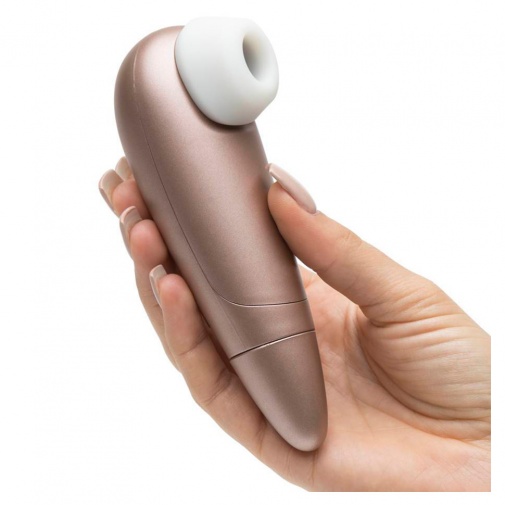 Zlatý stimulátor na satie klitorisu s jedenástimi módmi ovládanými tlačítkom.
