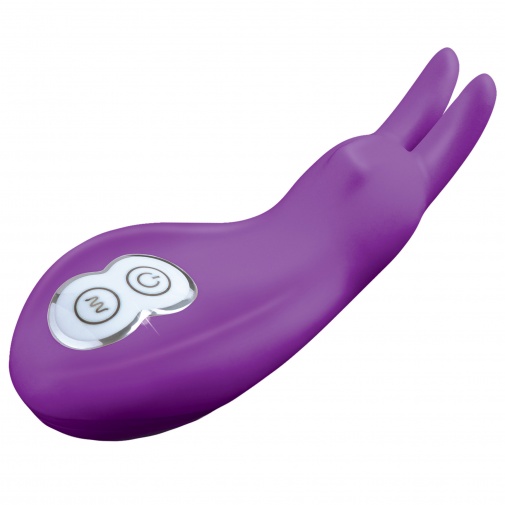Menší silikónový vibrátor fialovej farby v tvare zajačika s uškami na dráždenie klitorisu a výkonným motorčekom.
