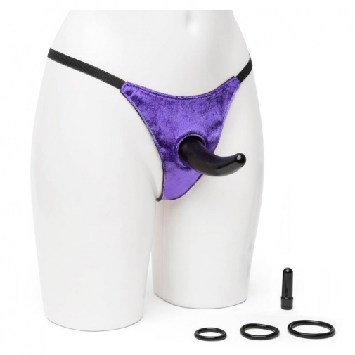 Vibračný strap-on s malým čiernym análnym kolíkom s jemným zakrivením na priamu stimuláciu prostaty s možnosťou použitia kolíka samostatne.